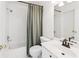 Classic bathroom featuring a standard tub with shower, a toilet, and a vanity with a large mirror at 2720 Stillwater Lake Ln, Marietta, GA 30066