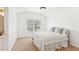 Cozy bedroom featuring neutral tones, a large window, and plush bedding for a relaxing atmosphere at 2720 Stillwater Lake Ln, Marietta, GA 30066
