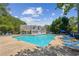 Sparkling community pool with lounge chairs at 2720 Stillwater Lake Ln, Marietta, GA 30066