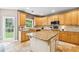 Beautiful kitchen with granite countertops, central island, and tiled backsplash at 2720 Stillwater Lake Ln, Marietta, GA 30066