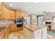 Eat-in kitchen with stainless appliances, stone floors, and granite countertops at 2720 Stillwater Lake Ln, Marietta, GA 30066