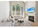 Inviting living room with soaring ceilings, fireplace, and large windows at 2720 Stillwater Lake Ln, Marietta, GA 30066