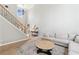 Inviting living room with a staircase and comfortable seating with lots of light at 2720 Stillwater Lake Ln, Marietta, GA 30066