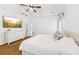 Bright main bedroom boasts a vaulted ceiling, plush carpeting, white trim and large television at 2720 Stillwater Lake Ln, Marietta, GA 30066
