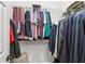 Walk-in closet with wire shelving and racks for hanging clothes and accessories at 2720 Stillwater Lake Ln, Marietta, GA 30066