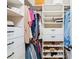 Organized walk-in closet featuring shelving, drawers, and hanging racks for optimal storage at 2720 Stillwater Lake Ln, Marietta, GA 30066