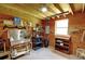 A utility area inside the barn provides shelving, sink, storage and a workbench space at 4393 Cannon Rd, Loganville, GA 30052