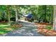 Charming home featuring mature trees and a long driveway providing seclusion and curb appeal at 4393 Cannon Rd, Loganville, GA 30052
