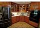 Well-lit kitchen features custom cabinets and updated appliances at 4393 Cannon Rd, Loganville, GA 30052