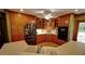 Updated kitchen with custom wood cabinets, countertops, and stainless steel appliances at 4393 Cannon Rd, Loganville, GA 30052