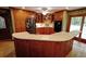 The well-lit kitchen boasts custom wood cabinets and updated appliances at 4393 Cannon Rd, Loganville, GA 30052