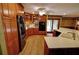 Well-equipped kitchen featuring custom cabinets, countertops, and stainless steel appliances at 4393 Cannon Rd, Loganville, GA 30052