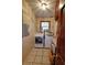 Laundry room with a window providing natural light, a washer and dryer, and overhead lighting at 4393 Cannon Rd, Loganville, GA 30052