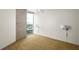 Bright bedroom with natural light, modern sconces, and neutral-toned carpeting at 855 Peachtree Ne St # 3304, Atlanta, GA 30308
