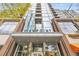 Viewpoint building entrance featuring modern architecture and retail storefronts at 855 Peachtree Ne St # 3304, Atlanta, GA 30308