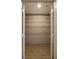 Spacious walk-in closet with adjustable shelving and open doors at 855 Peachtree Ne St # 3304, Atlanta, GA 30308