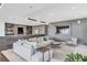 Modern living room with a cozy seating area, television and bar area at 855 Peachtree Ne St # 3304, Atlanta, GA 30308