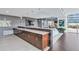 Modern lounge area with kitchen, bar seating and plenty of counter space at 855 Peachtree Ne St # 3304, Atlanta, GA 30308