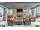 Relaxing outdoor lounge area with comfortable seating, fireplace, and TV, perfect for entertaining guests at 855 Peachtree Ne St # 3304, Atlanta, GA 30308