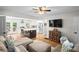 A beautifully decorated living room seamlessly transitions to the open kitchen and dining area at 2703 Carolyn Se Dr, Smyrna, GA 30080