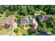 Aerial view of the home showcasing its mature landscaping, pool, and desirable neighborhood at 5004 Haralson Sw Way, Lilburn, GA 30047