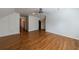Large bedroom featuring a ceiling fan, hardwood floors, and natural light at 5004 Haralson Sw Way, Lilburn, GA 30047
