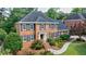 Traditional brick home with manicured front yard and inviting entrance at 5004 Haralson Sw Way, Lilburn, GA 30047