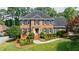Beautiful brick home with well-maintained lawn and landscaping, offering great curb appeal at 5004 Haralson Sw Way, Lilburn, GA 30047