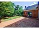 Brick patio overlooking the backyard at 5004 Haralson Sw Way, Lilburn, GA 30047