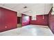 Spacious basement featuring painted walls and tile flooring at 5419 Ahyoka Dr, Morrow, GA 30260