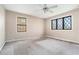 Bedroom with ceiling fan and bright, window-filled natural light at 5419 Ahyoka Dr, Morrow, GA 30260