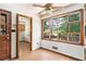 Sun-drenched breakfast nook with large windows, tile flooring, and access to a small deck at 5419 Ahyoka Dr, Morrow, GA 30260