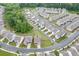 Spacious community with well-maintained homes, lush greenery, and manicured lawns, near walking trails at 1459 Bennett Creek Ovlk, Suwanee, GA 30024