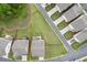 Aerial view showcasing the property lines, surrounded by lush landscaping and neighboring houses at 1459 Bennett Creek Ovlk, Suwanee, GA 30024
