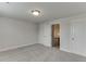 Comfortable bedroom with neutral carpeting and access to hallway, and closets at 1459 Bennett Creek Ovlk, Suwanee, GA 30024