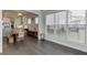 Bright breakfast nook featuring hardwood floors, white walls and large windows at 1459 Bennett Creek Ovlk, Suwanee, GA 30024