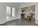 Bright foyer with double doors, leading to the kitchen, living, and dining areas with hardwood floors at 1459 Bennett Creek Ovlk, Suwanee, GA 30024