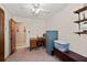 Functional bedroom with desk, file cabinet, shelving and plenty of storage at 2880 Sherwood Se Rd, Smyrna, GA 30082