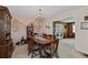 Traditional dining room featuring a chandelier, mural, and classic furniture at 2880 Sherwood Se Rd, Smyrna, GA 30082