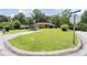 Brick home on a corner lot with a well-kept lawn and a convenient carport at 2880 Sherwood Se Rd, Smyrna, GA 30082