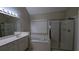 Well-lit bathroom with shower, bath, and white vanity at 3618 Prescot Way, Douglasville, GA 30135