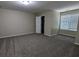 Spacious bedroom with carpet, window and closet at 3618 Prescot Way, Douglasville, GA 30135