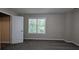 Bedroom with carpet, window, and closet at 3618 Prescot Way, Douglasville, GA 30135