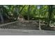 Deck with wood railings overlooking private, wooded backyard at 3618 Prescot Way, Douglasville, GA 30135