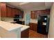 Kitchen with stainless steel appliances, ample cabinet space, and breakfast bar area at 3618 Prescot Way, Douglasville, GA 30135