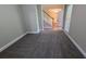 Living room featuring stairs and hardwood floors that are visible from the doorway at 3618 Prescot Way, Douglasville, GA 30135