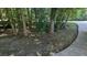 Mature trees provide natural beauty and shade at 3618 Prescot Way, Douglasville, GA 30135