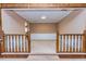 Inviting dining room with chair rail molding and wooden railing at 166 Muse Rd, Fayetteville, GA 30214