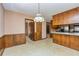 The dining room connects to the kitchen and has doors leading to the screened porch at 166 Muse Rd, Fayetteville, GA 30214