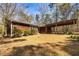 Exterior of a charming home with a side carport at 166 Muse Rd, Fayetteville, GA 30214